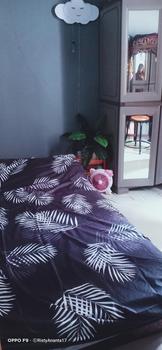 Product Review of SPREI MOTIF BLACK PALM BERKWALITAS ADEM Bantal Guling Karet Sarung Kain from R**y 1