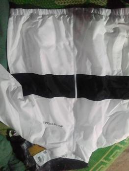 Product Review of ÁO KHOÁC DÙ TRƠN CỔ BẺ FORM RỘNG MS Nữ Jacket from T**o 1